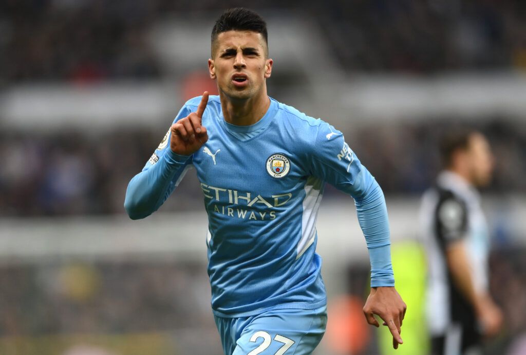 Cancelo in action for Man City