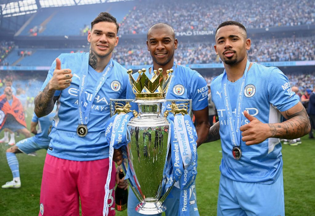 Ederson, Fernandinho and Jesus with PL trophy