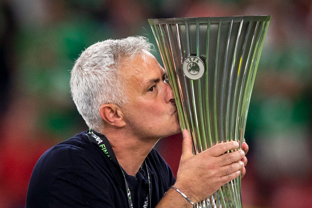 Jose Mourinho kisses the UEFA Europa Conference League Trophy