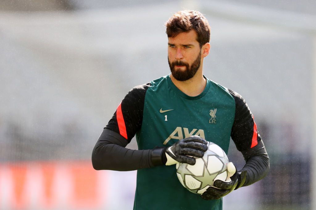 Alisson Becker in action for Liverpool