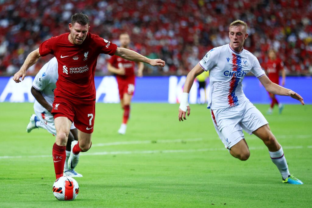 James Milner of Liverpool controls the ball against Killian Phillips