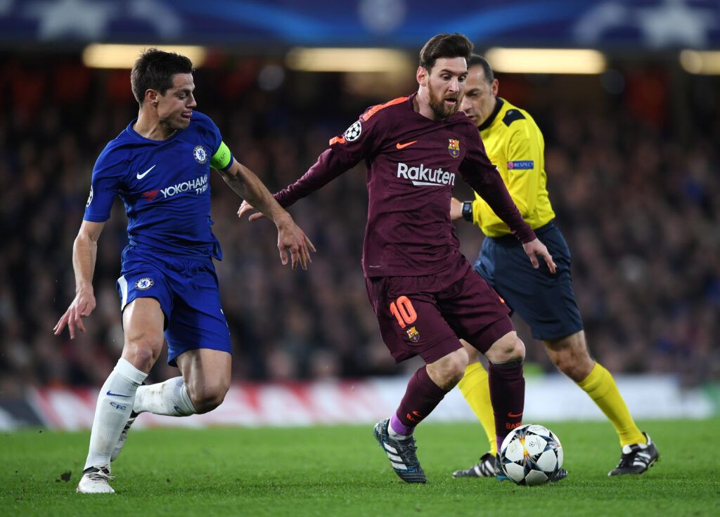 Azpilicueta against Barcelona's Lionel Messi in 2018
