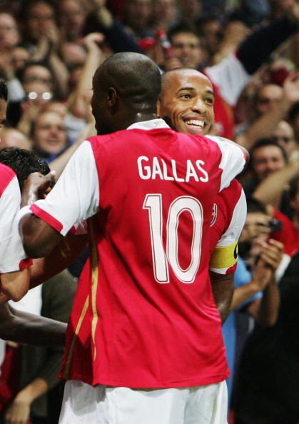 Gallas celebrates with Henry.