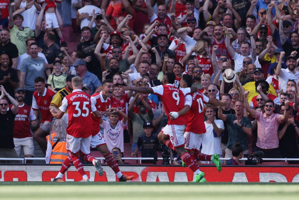 Arsenal players celebrate goal against Leicester City