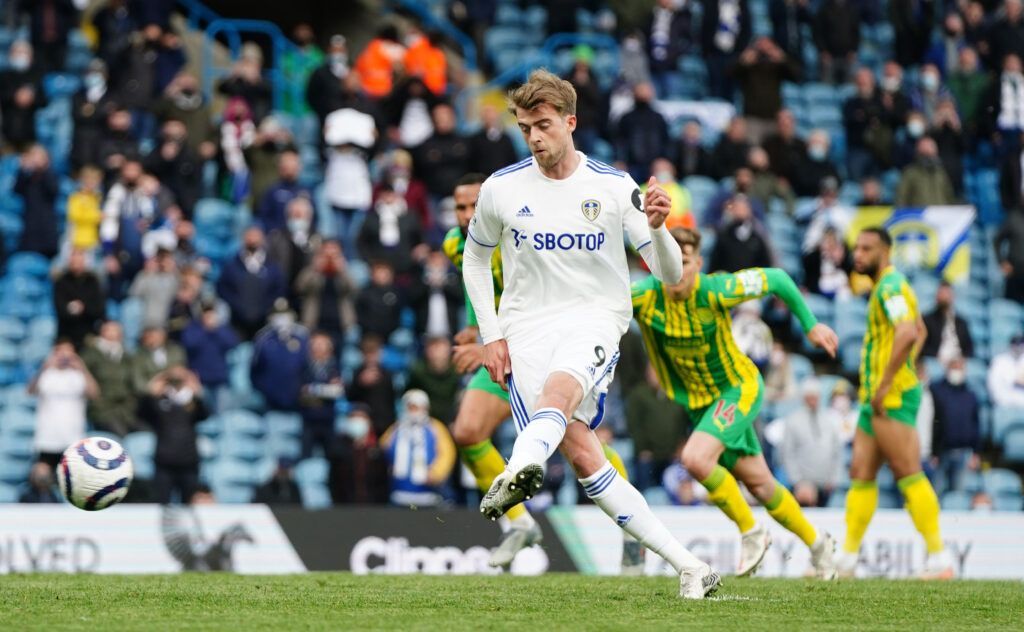 Patrick Bamford of Leeds United scores his team's third goal from a penalty 