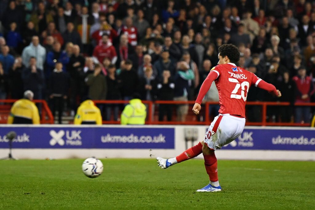 Brennan Johnson of Nottingham Forest scores their side's first goal from a penalty