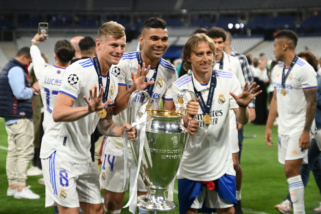 Casemiro poses with Kroos and Modric after winning the 2022 Champions League