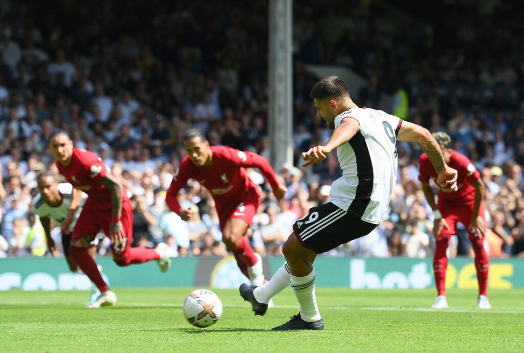 Aleksandar Mitrovic of Fulham scores their side's second goal from a penalty