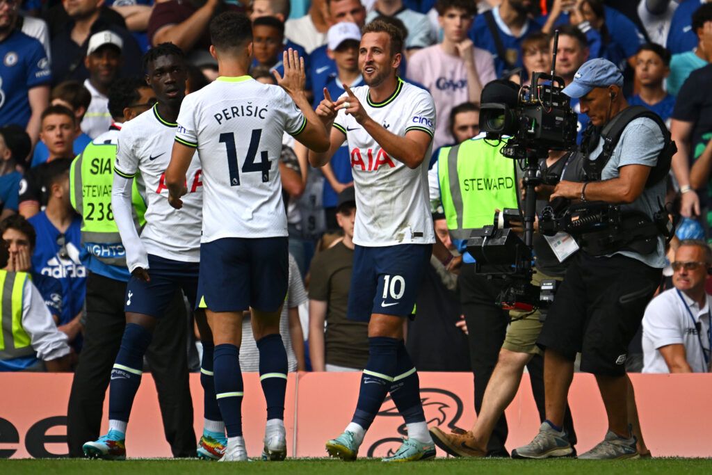 Harry Kane of Tottenham Hotspur celebrates with team mates after scoring their sides second goal 