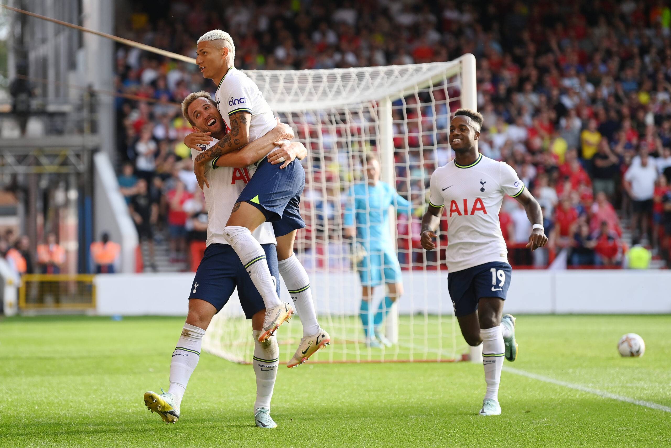 Harry Kane of Tottenham Hotspur celebrates with Richarlison