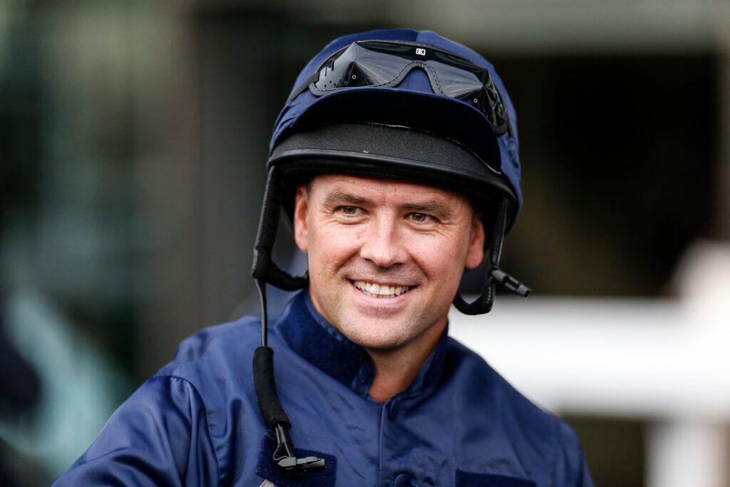 Michael Owen preparing to ride in a charity race