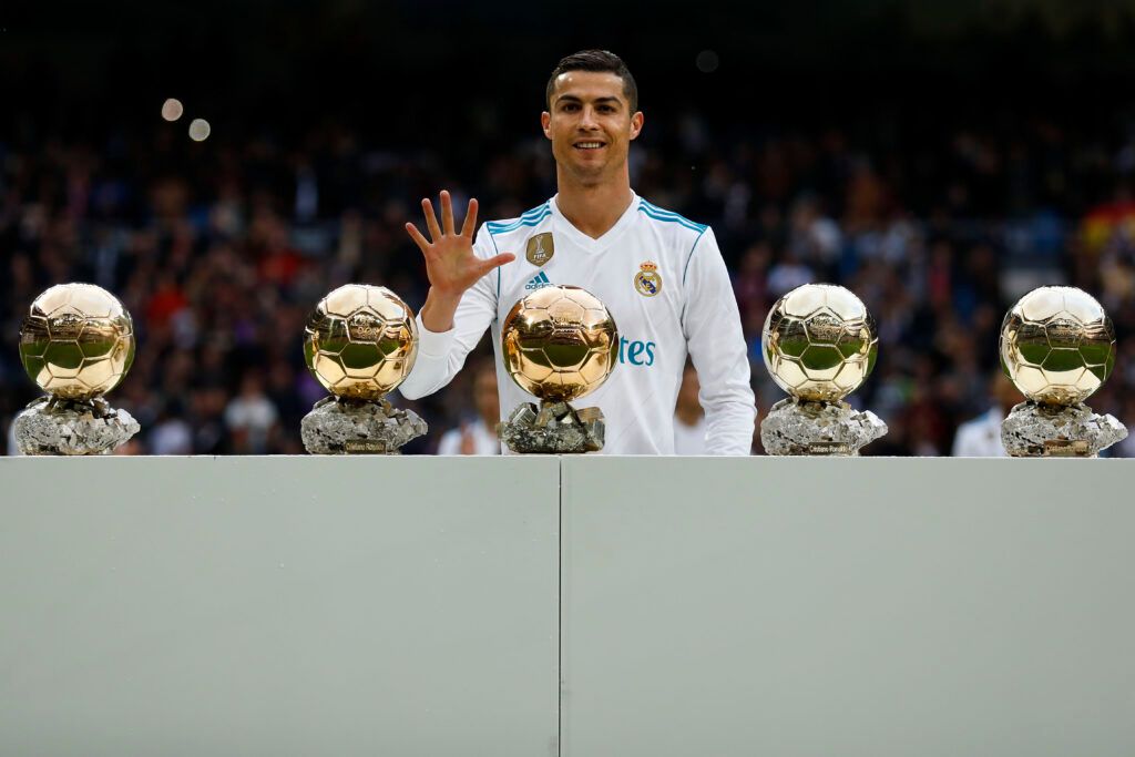 Cristiano Ronaldo with his five Ballon d'Or awards