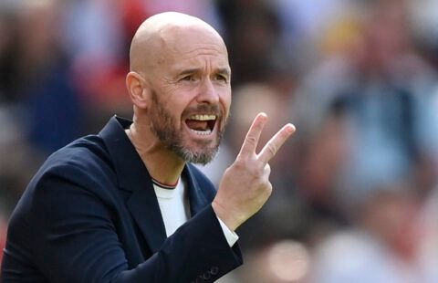 Manchester United boss Erik ten Hag passes instructions onto his players