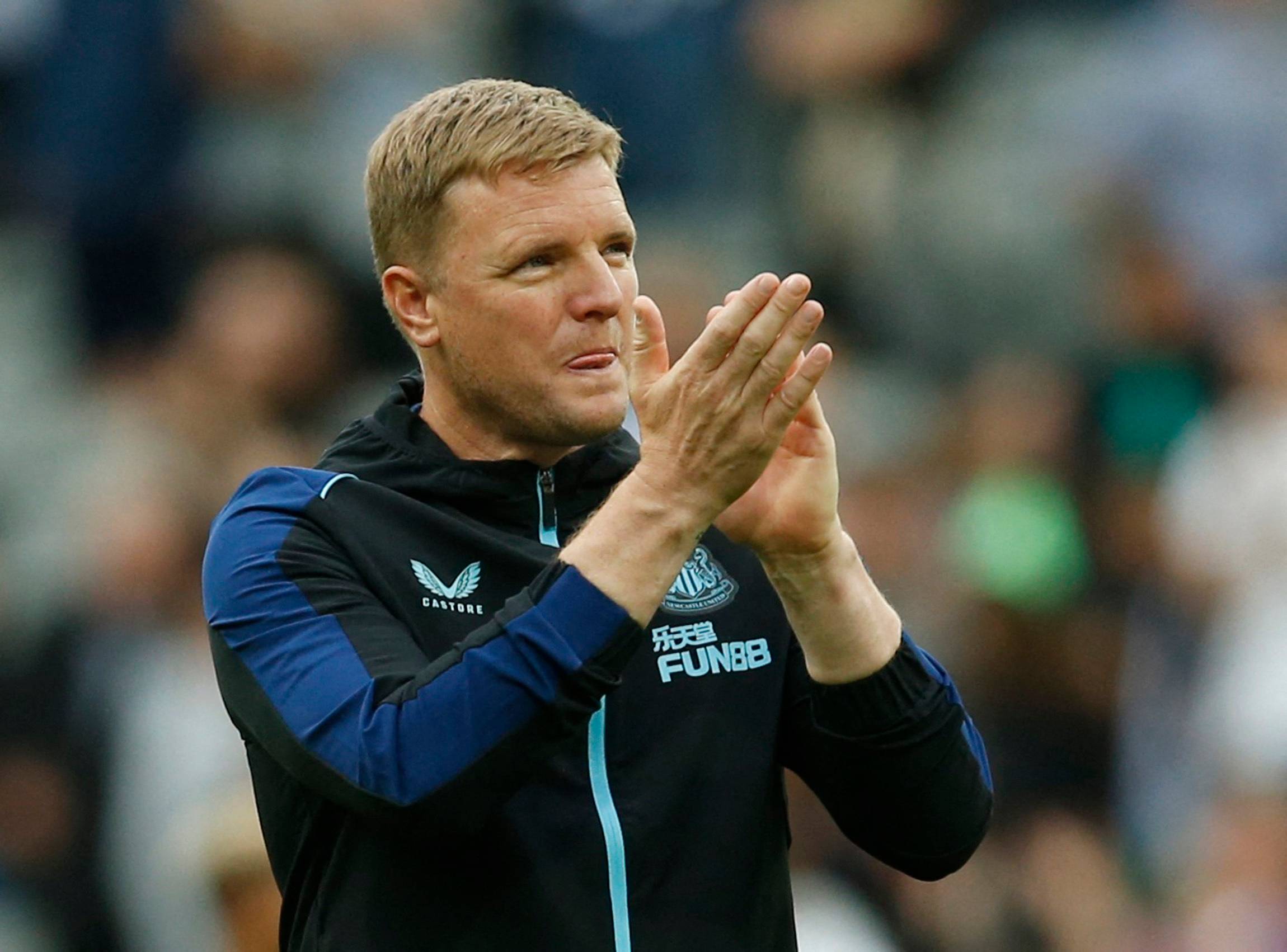 Newcastle United manager Eddie Howe claps supporters