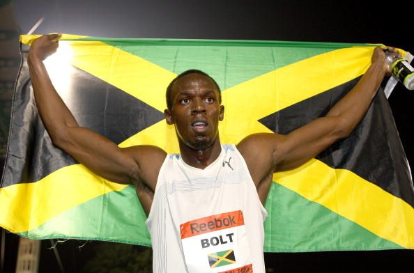 Bolt celebrates his 100m world record.