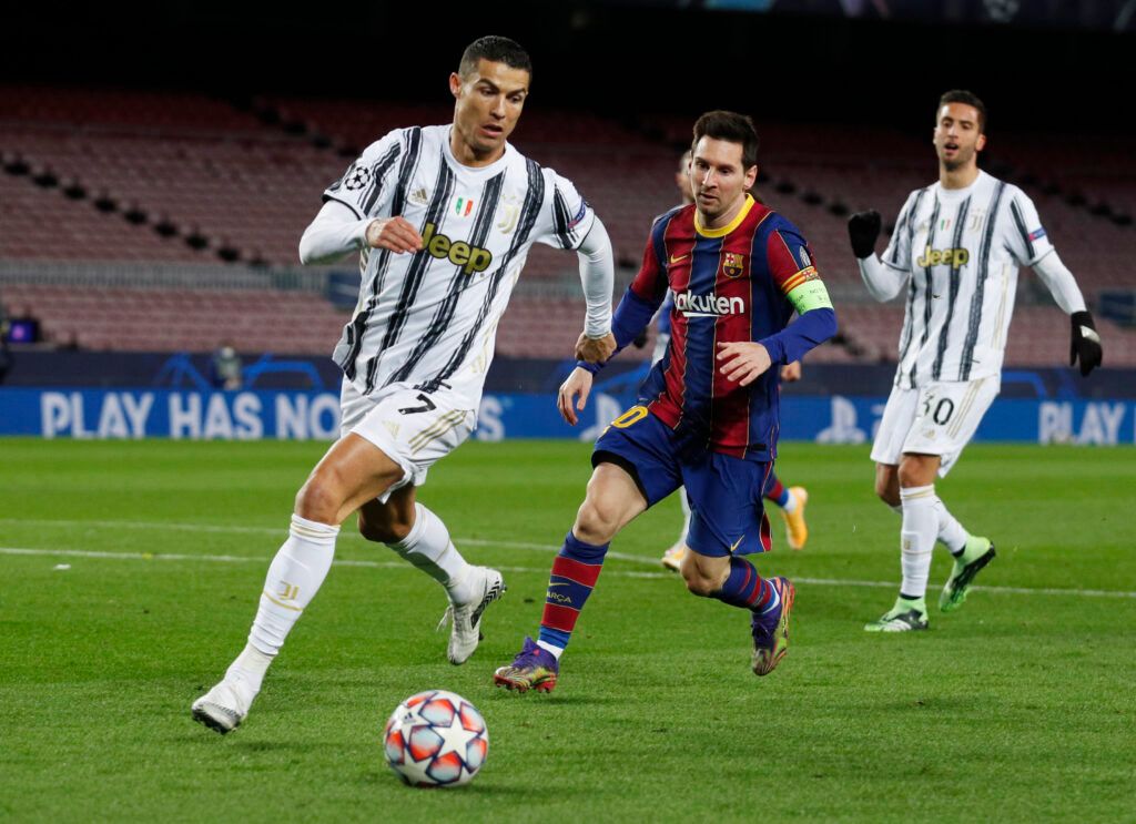Ronaldo and Messi in action.