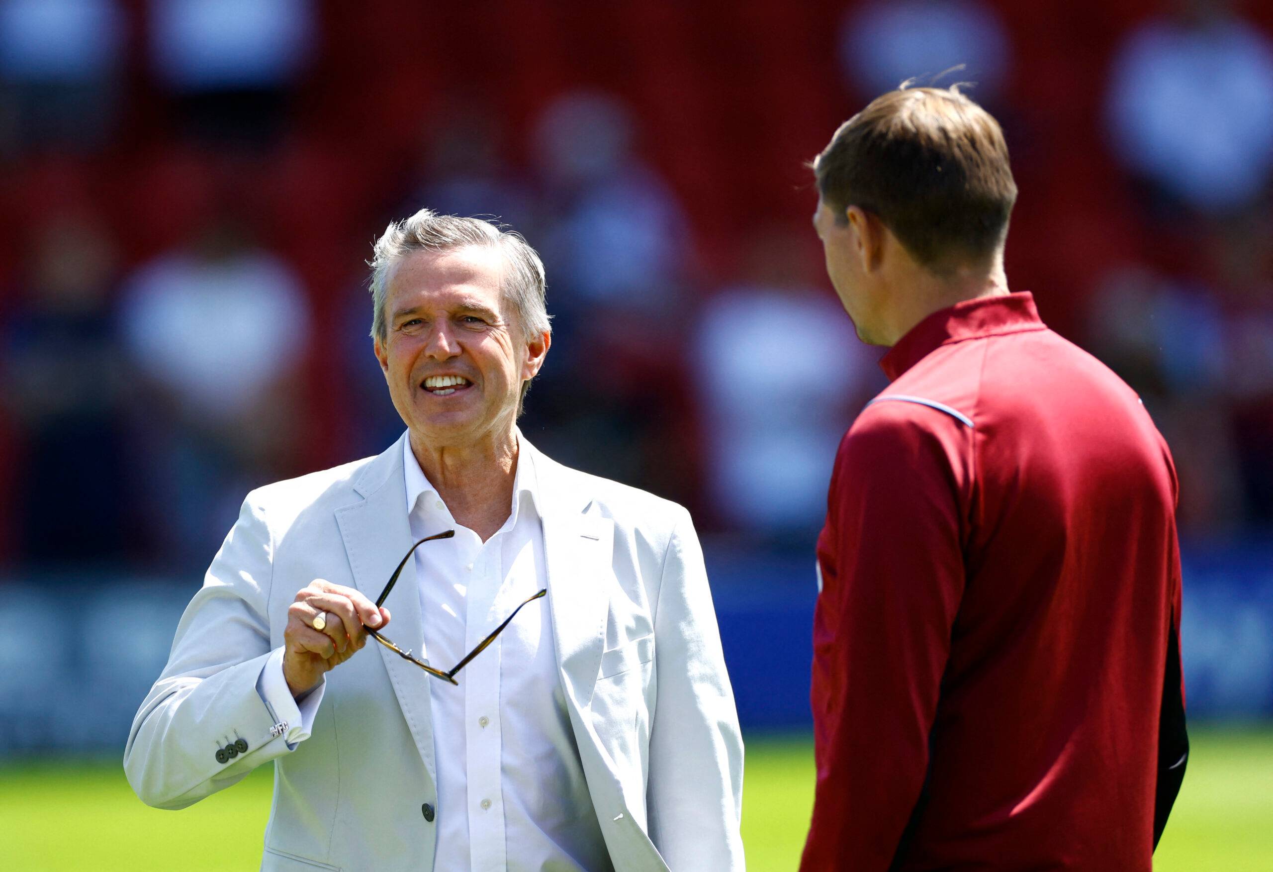 Aston Villa chief executive Christian Purslow in conversation with Steven Gerrard