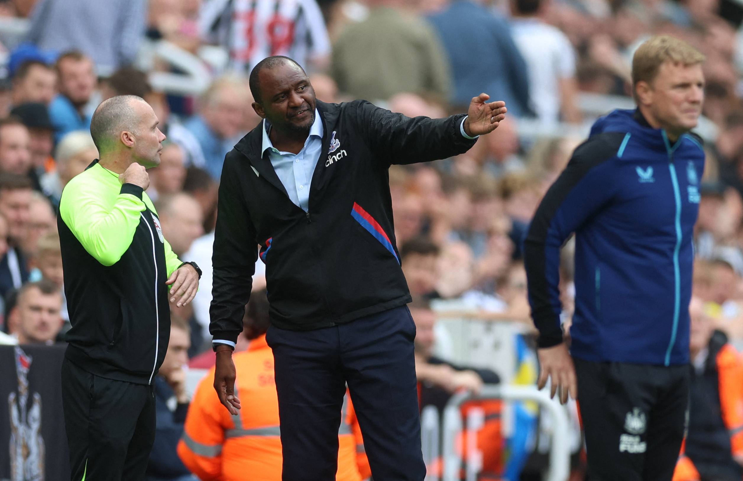 Crystal Palace manager Patrick Vieira speaks with fourth official