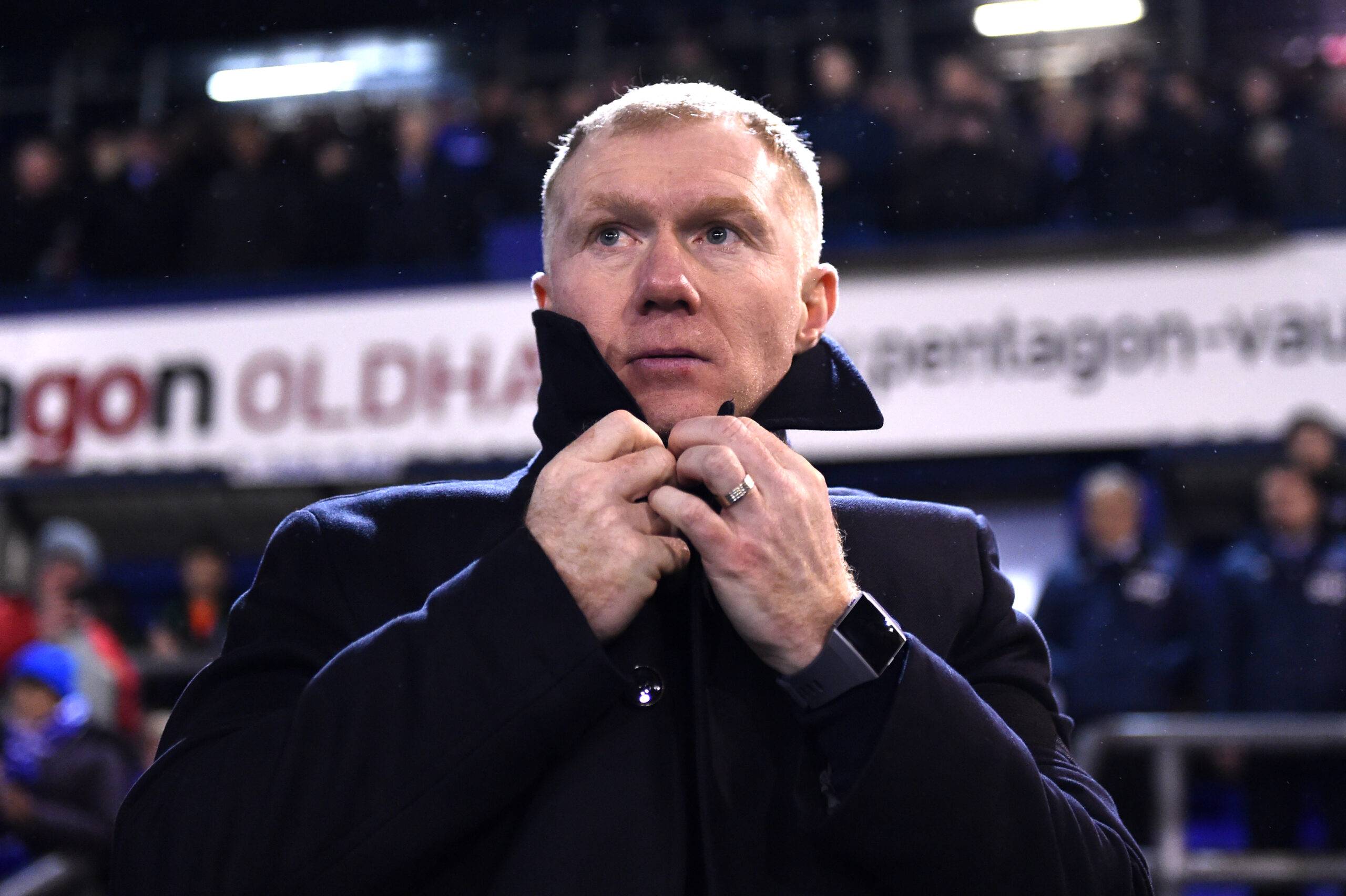 Paul Scholes watches on from the sidelines