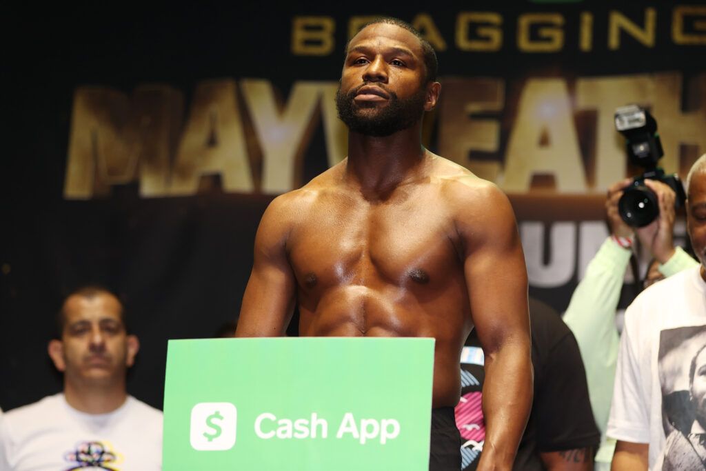 Floyd Mayweather takes part in the weigh-in 