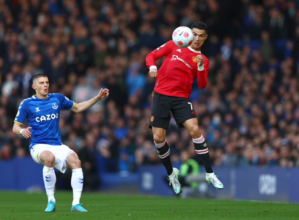 Cristiano Ronaldo of Manchester United jumps for the ball