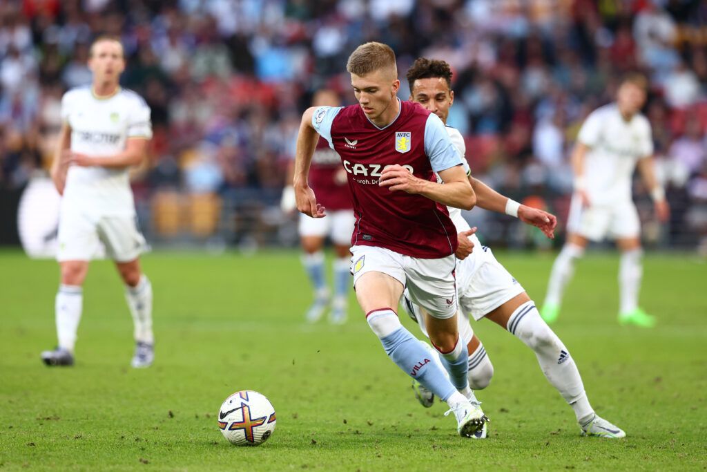 Rodrigo Moreno of Leeds United and Josh Feeney of Aston Villa compete for the ball during the 2022 Queensland Champions Cup match between Aston Villa and Leeds United at Suncorp Stadium on July 17, 2022 in Brisbane, Australia. 