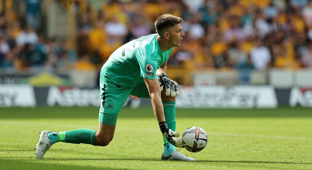 Nick Pope of Newcastle United rolls out the ball