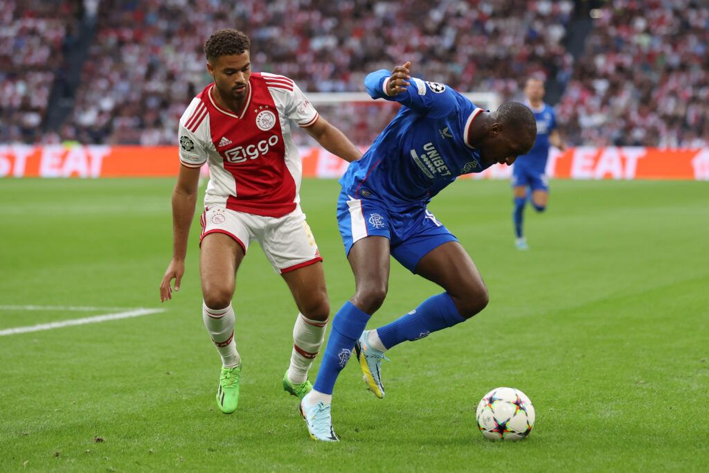 Glen Kamara of Rangers is put under pressure by Devyne Rensch of Ajax during the UEFA Champions League group A match between AFC Ajax and Rangers FC at Johan Cruyff Arena on September 07, 2022 in Amsterdam, Netherlands. 