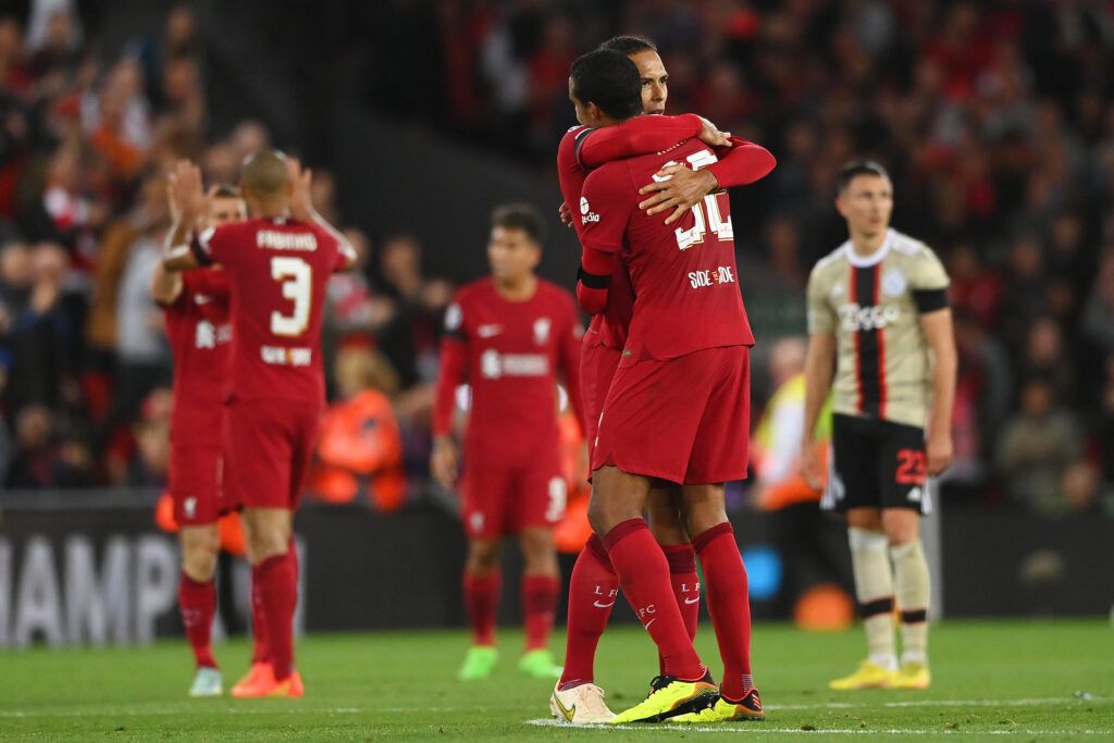 Virgil van Dijk and Joel Matip embrace after Liverpool 2-1 Ajax
