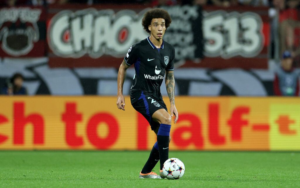 Axel Witsel of Atletico runs with the ball 
