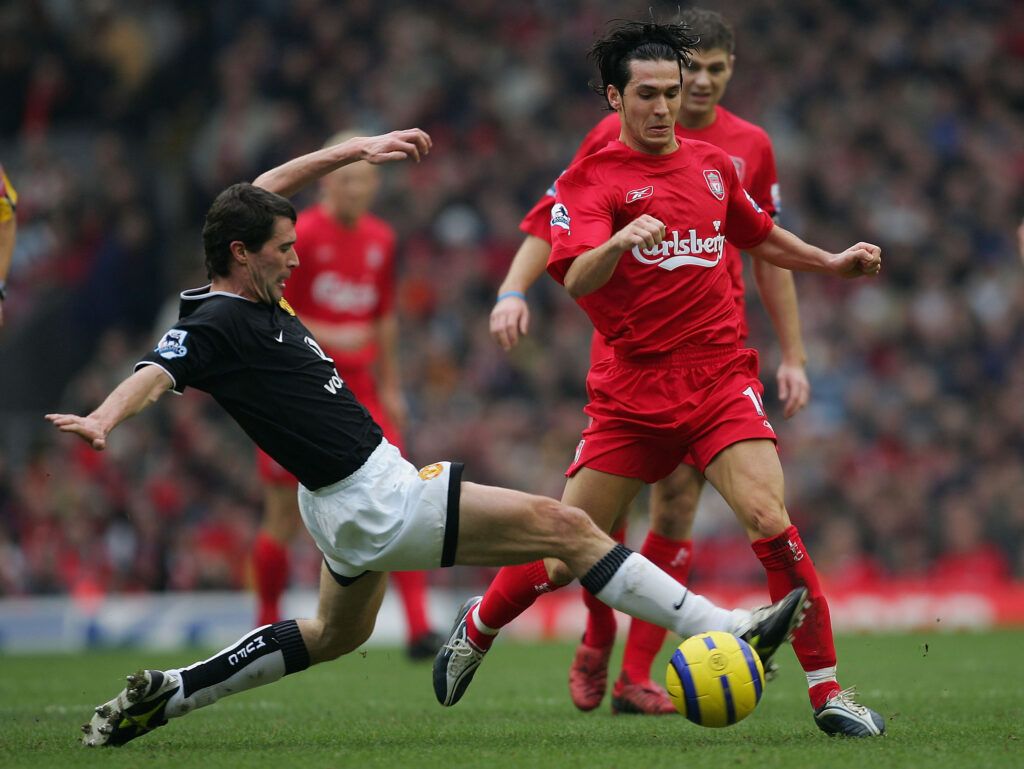 Roy Keane tackles Liverpool's Luis Garcia