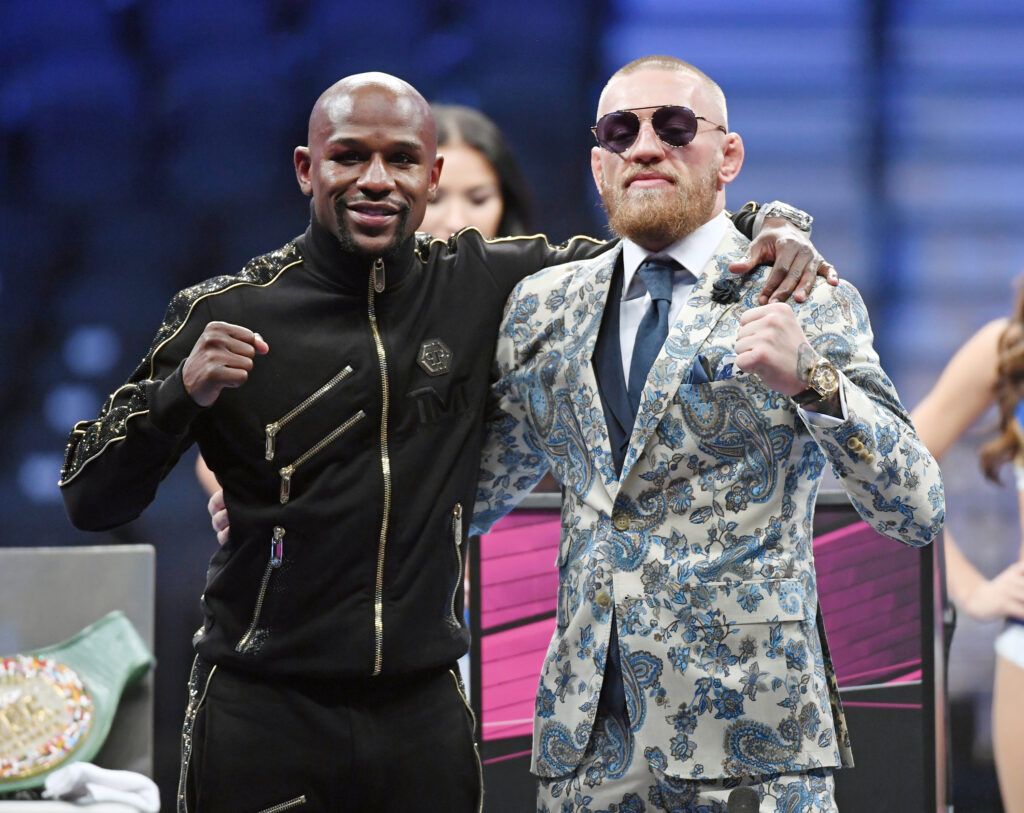 Conor McGregor and Floyd Mayweather pose for photos