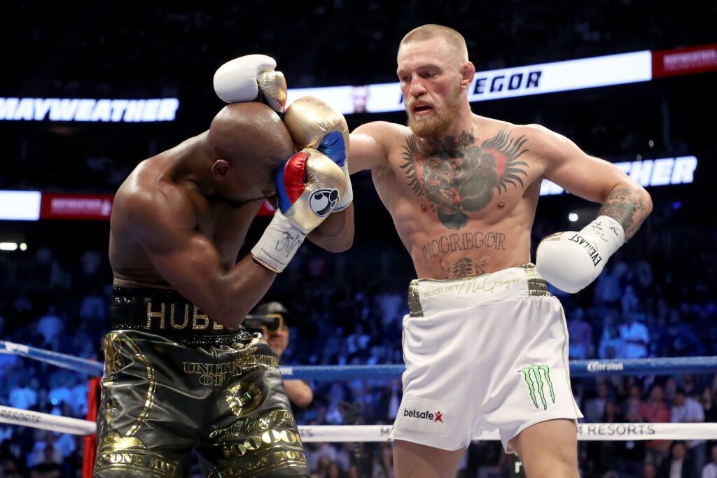 McGregor takes a swing at Mayweather