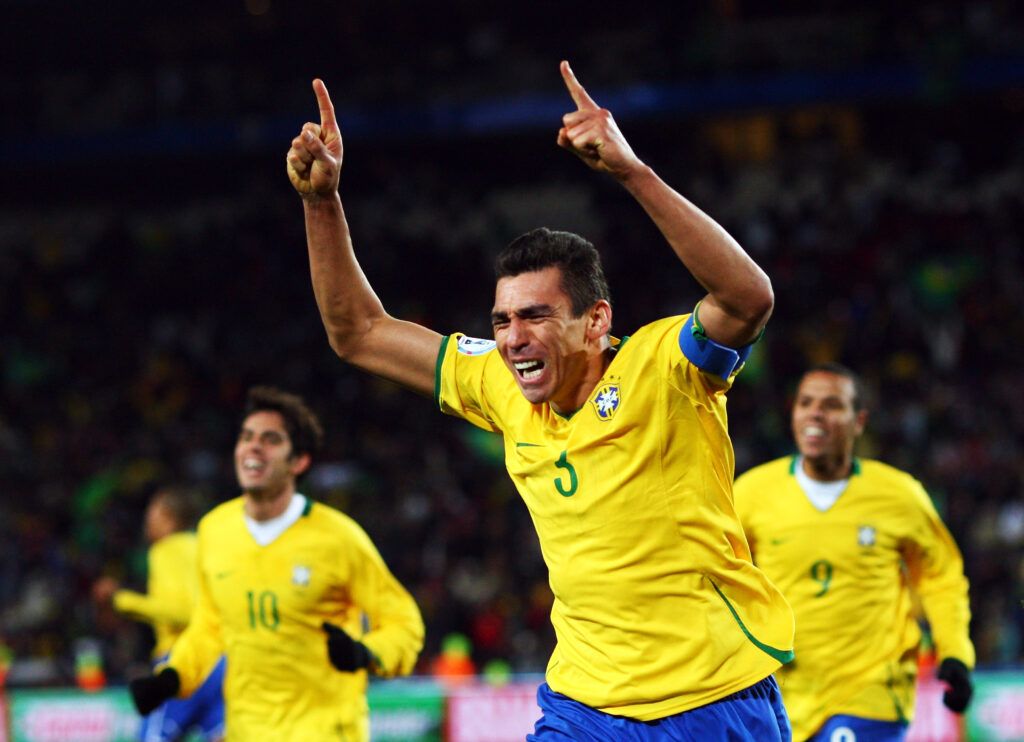 Lucio celebrates a goal for Brazil