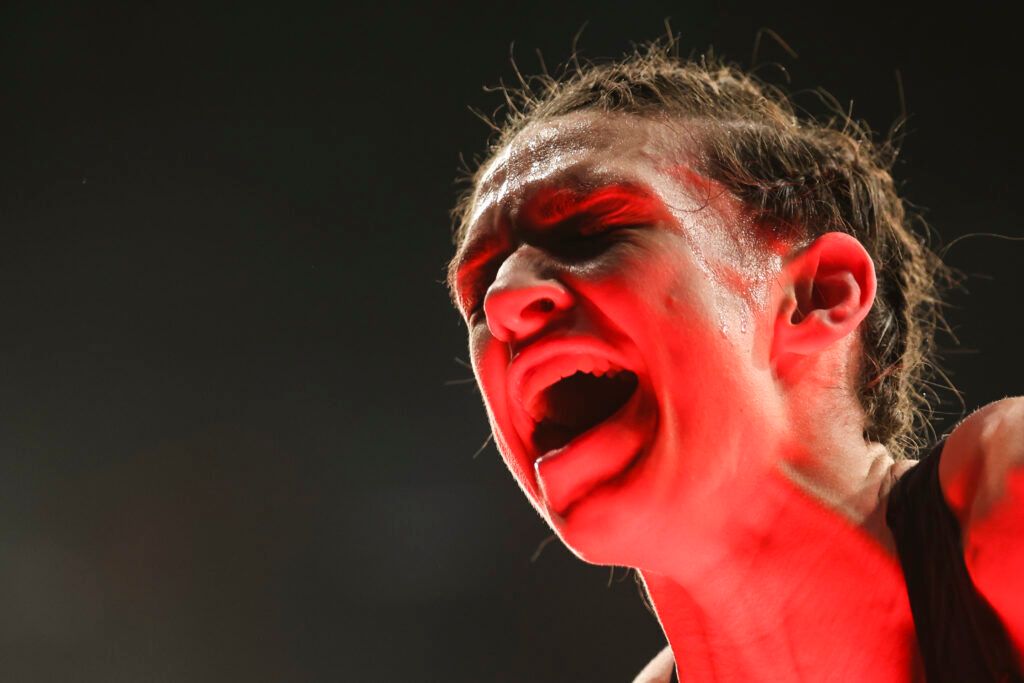 Mackenzie Dern celebrating in the UFC octagon