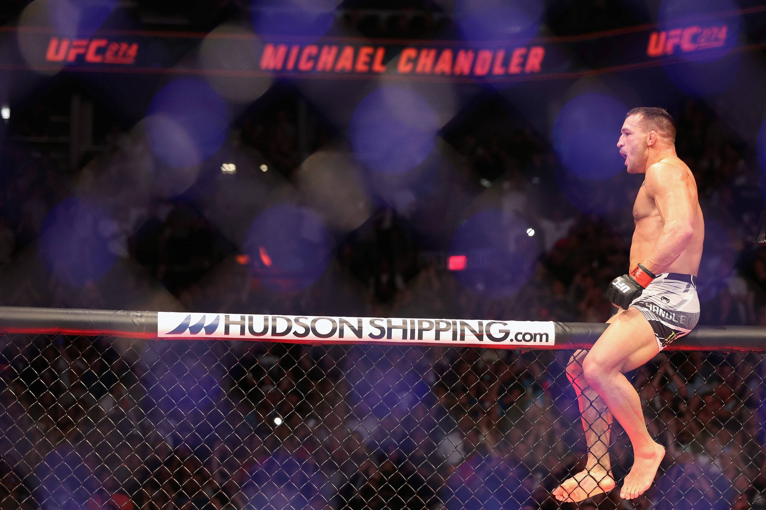 Michael Chandler sitting on the UFC octagon