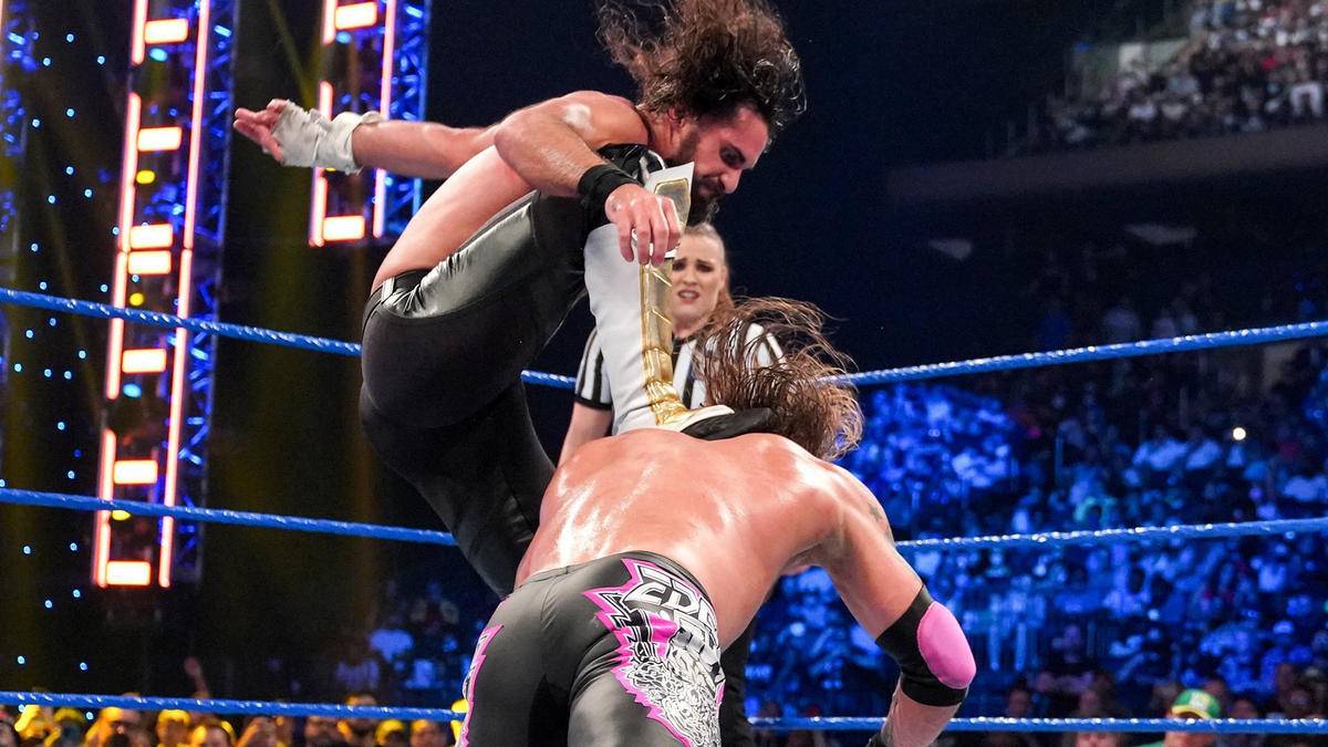 Seth Rollins stomping Edge on WWE SmackDown