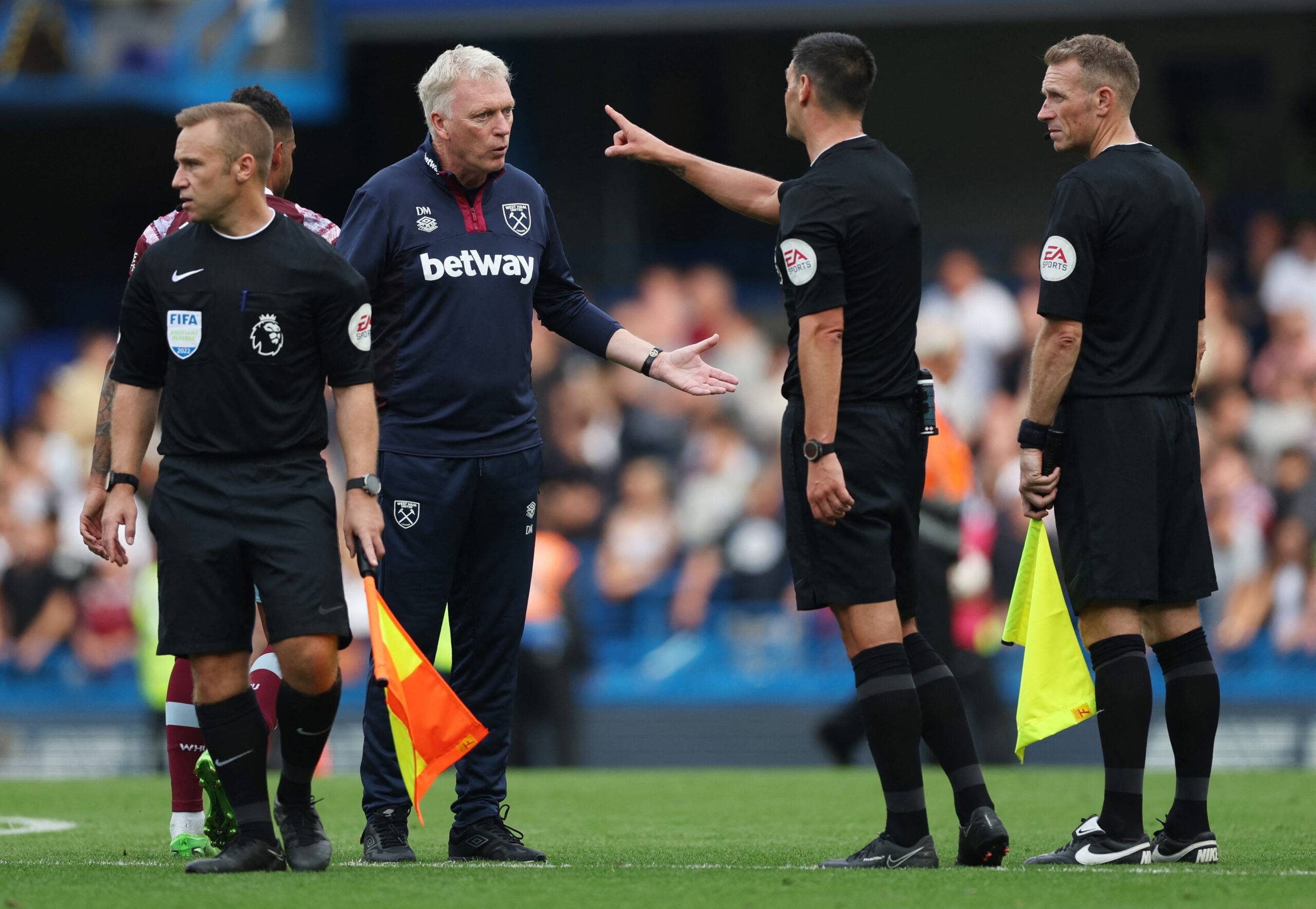 West Ham United manager David Moyes talks to referee