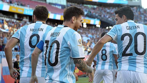 Messi and Gaitan playing for Argentina.