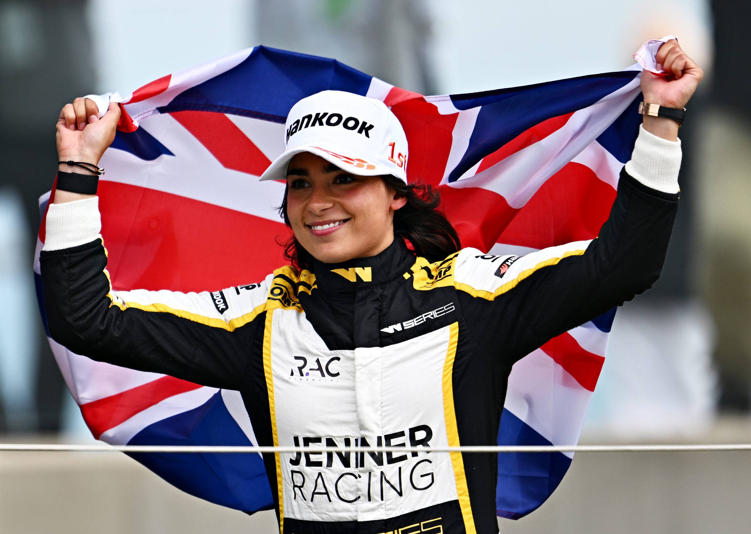 Jamie Chadwick celebrates winning the Silverstone Grand Prix
