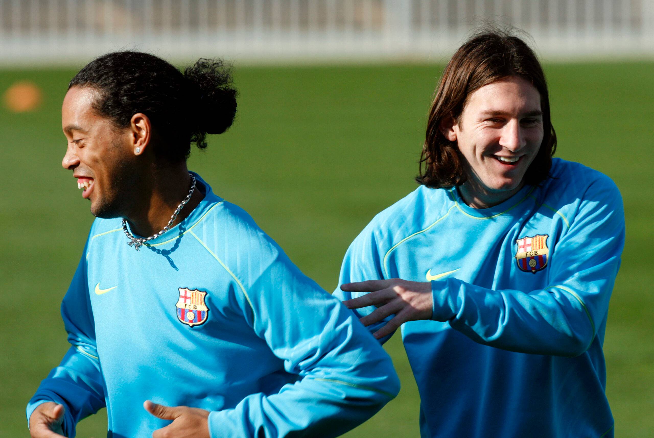 Ronaldinho and Messi at Barcelona.