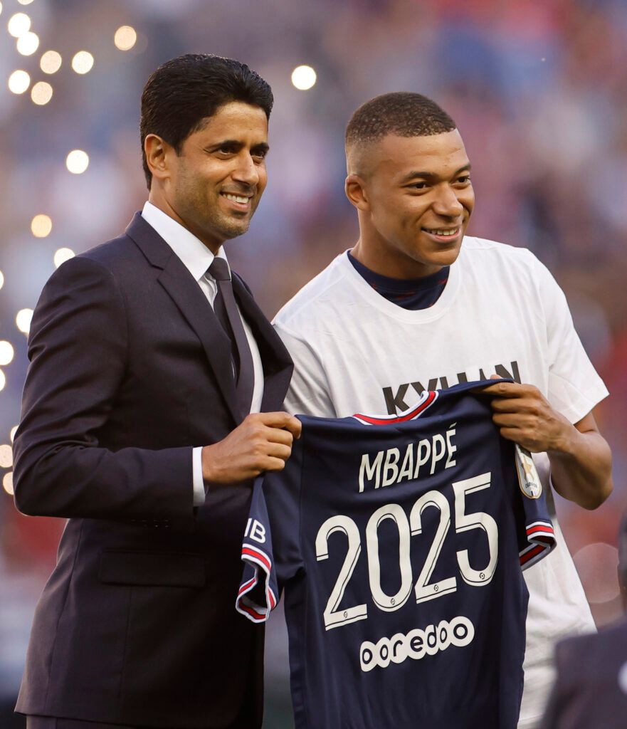 Mbappe re-signs for PSG.