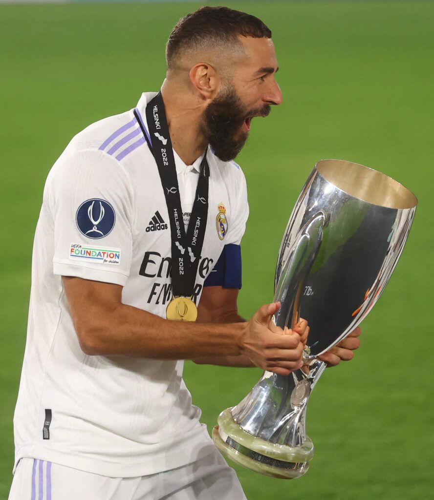 Benzems lifts the UEFA Super Cup.