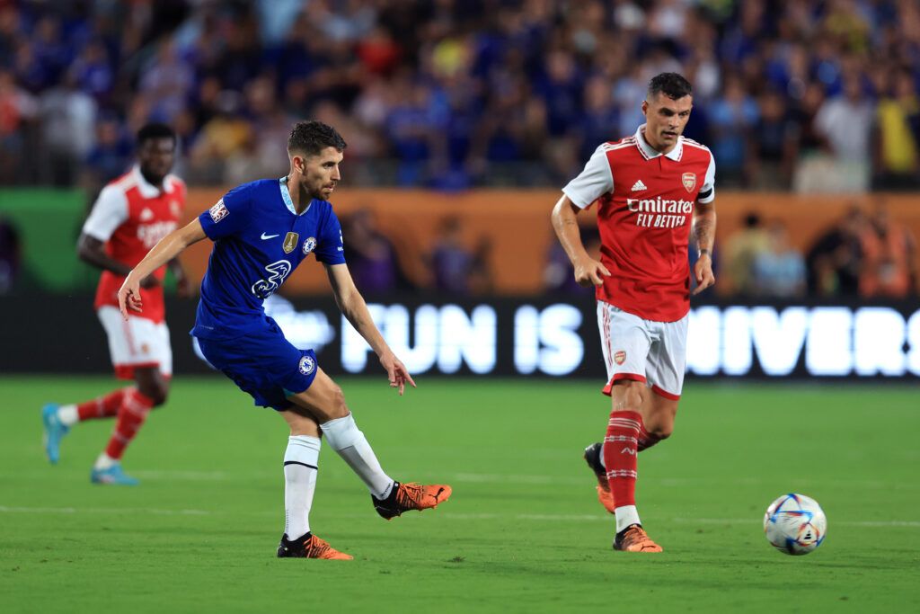 Chelsea's Jorginho passes the ball while under pressure from Arsenal's Granit Xhaka