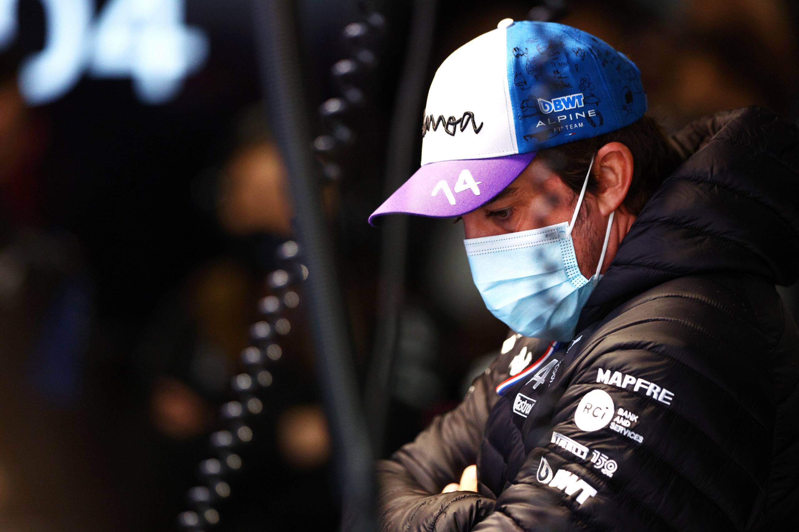 Fernando Alonso looks on in first practice at the Japanese GP