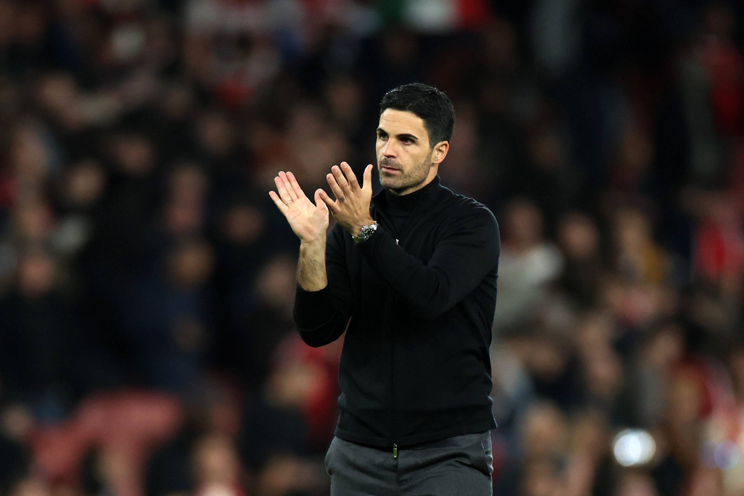 Arsenal boss Mikel Arteta applauding the supporters