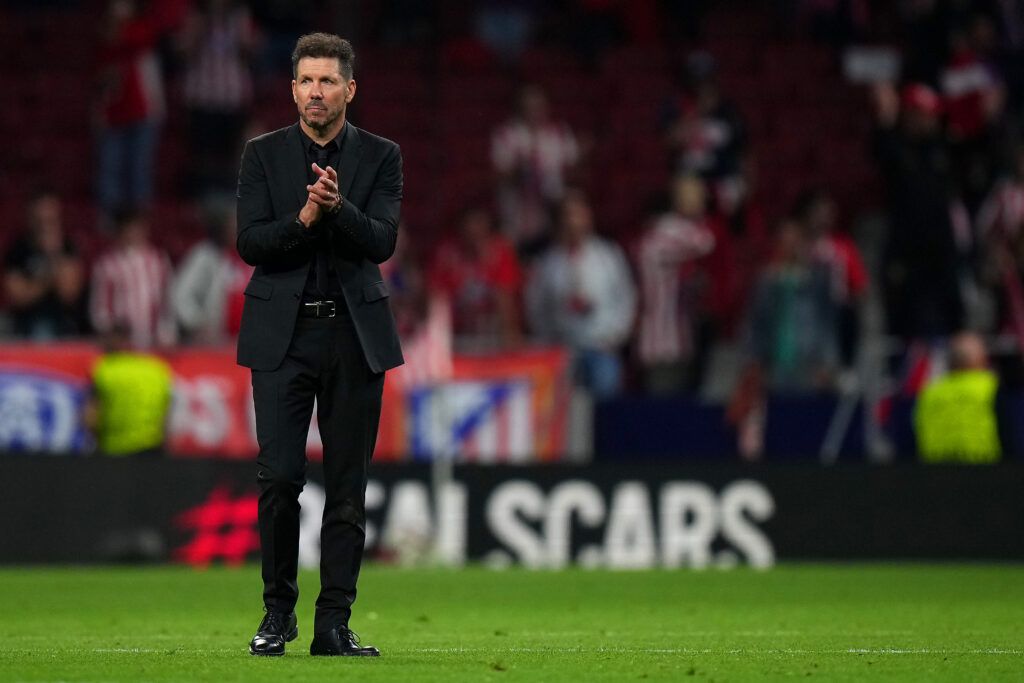 Diego Simeone looks dejected after Atletico crash out of Champions League