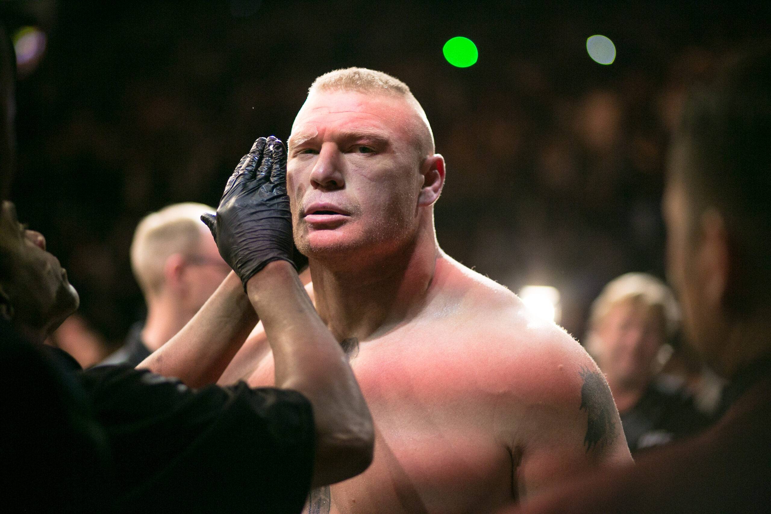 WWE: Brock Lesnar breaks character because of ringside fan's shouting