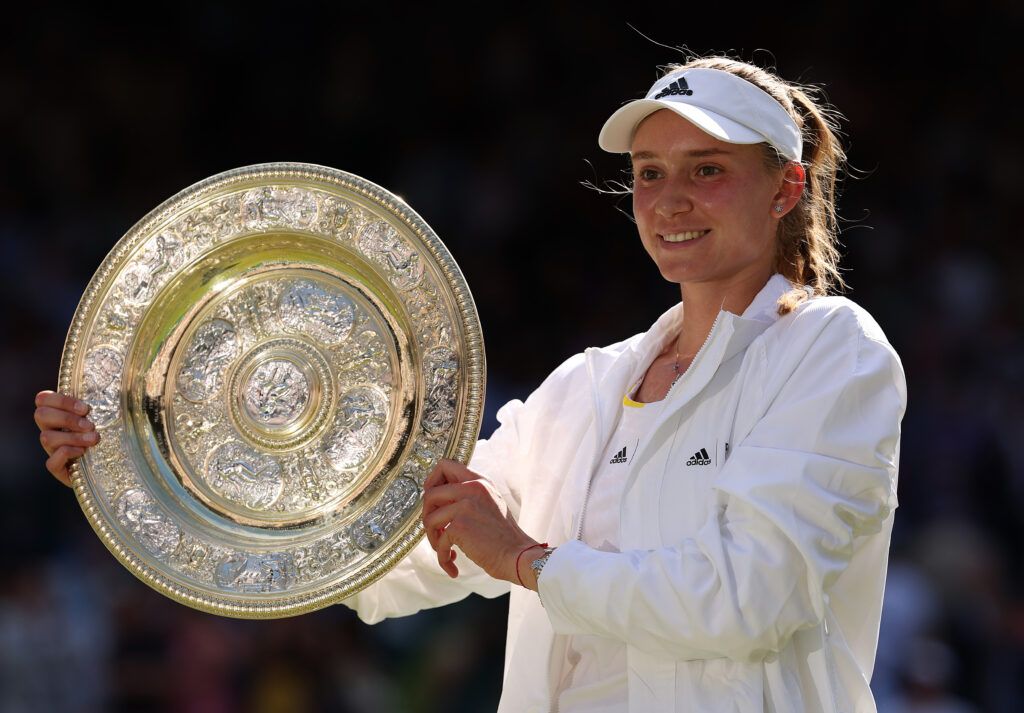 Elena Rybakina poses with the trophy after winning Wimbledon 2022
