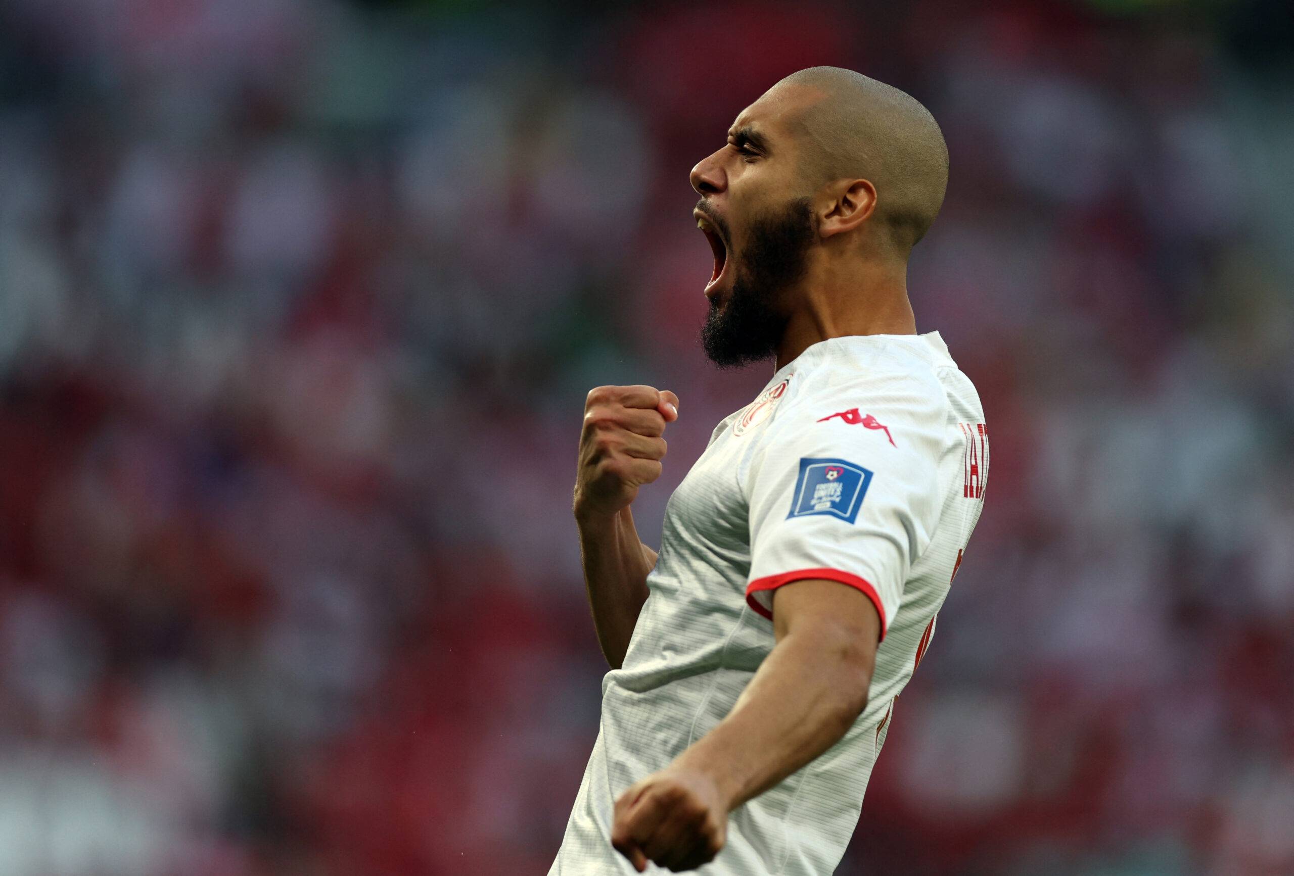 Tunisia's Laidouni celebrates his tackle.